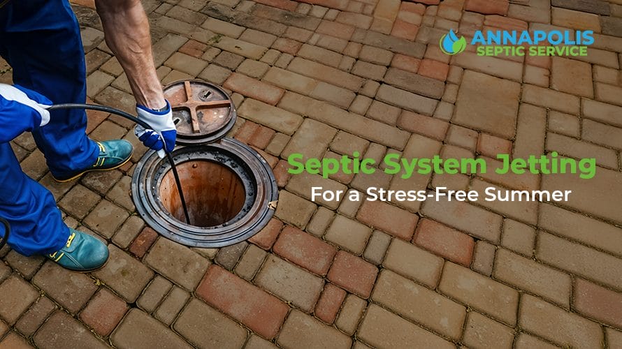 Technician performing septic tank jetting service before a summer event