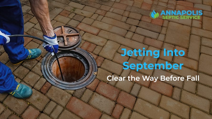 Technician performing jetting on a residential septic system in September